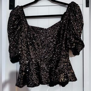 Black sequin peplum top